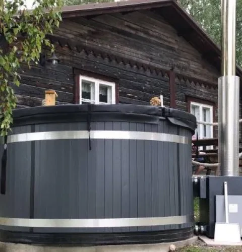 Un poêle à bois chauffe l'eau du bain | Kirami